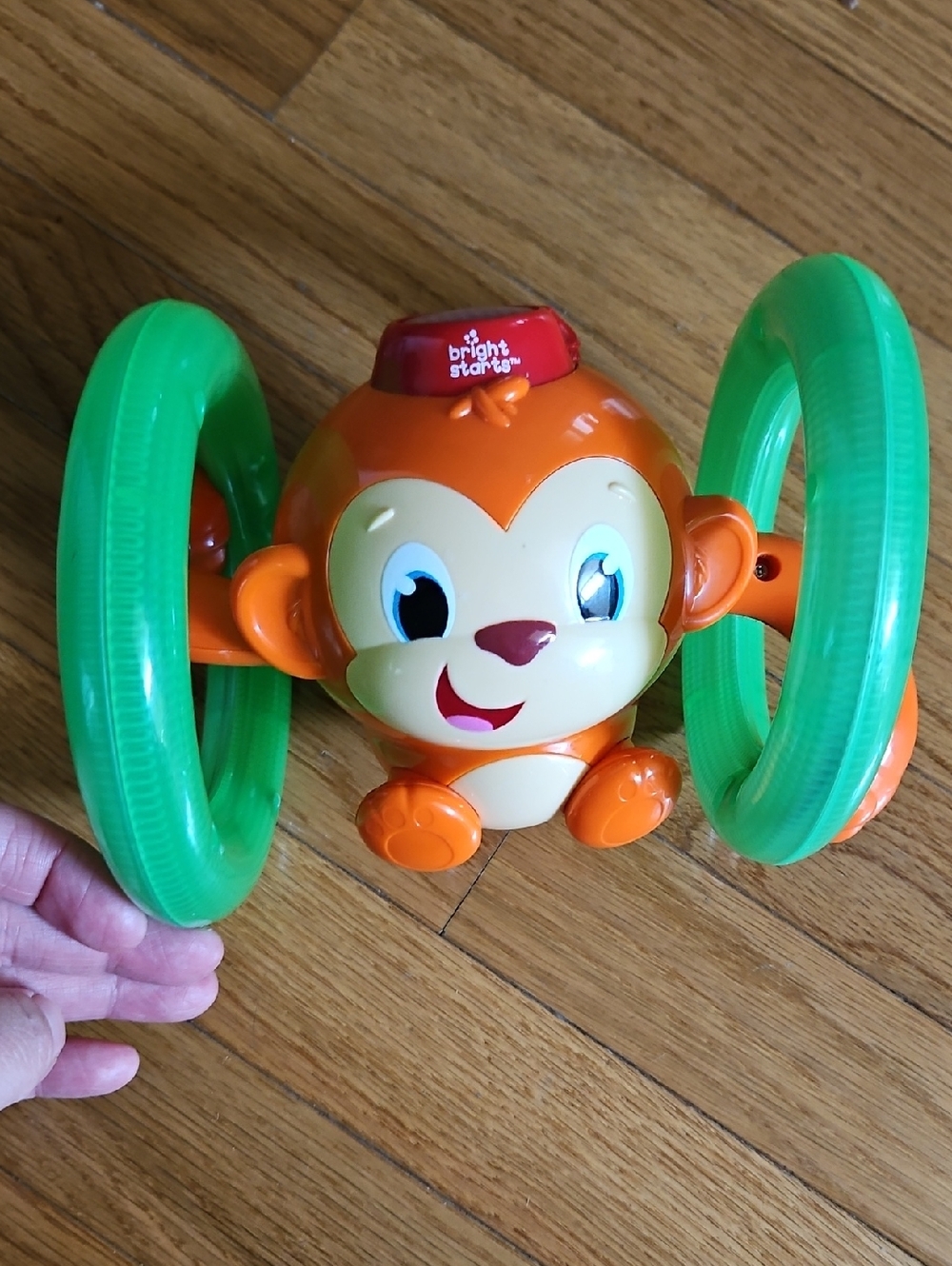 Bright Starts Orange Monkey with Green Rings - Baby Sensory Toy